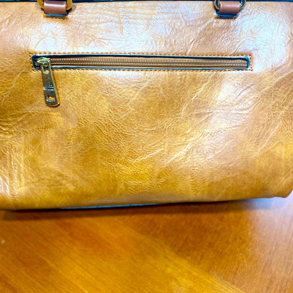 Brown duffle purse. No name leopard inside lining. - Picture 7 of 7